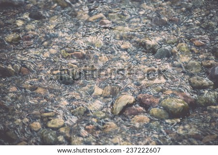 rocks in river - retro, vintage style look