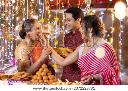 Happy Indian family celebrating diwali festival