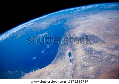 Stunning Satellite View of Israel, Lebanon, Gaza Strip, Turkey's Southeast Coast, and Cyprus Island from space. Elements of this image furnished by NASA Royalty-Free Stock Photo #2372236739
