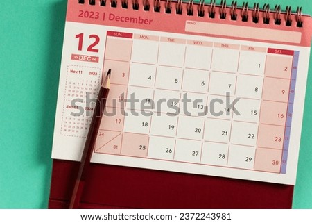 December calendar for 2023 on a colored background .Planning for every day.
