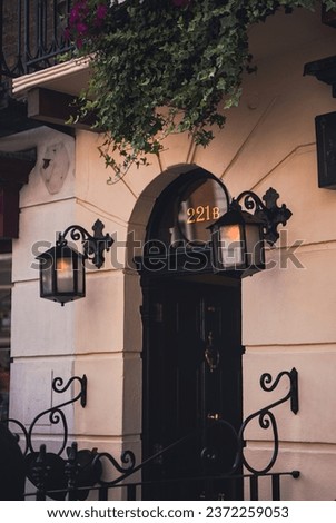 The door at 221b Baker Street, where Sherlock Holmes lived. Royalty-Free Stock Photo #2372259053