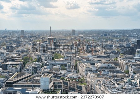 Aerial view of west London on a sunny day, classic St. Pauls cathedral amongst many modern buildings