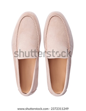 A pair of spring shoes. Beige suede loafers isolated on white background Royalty-Free Stock Photo #2372311249