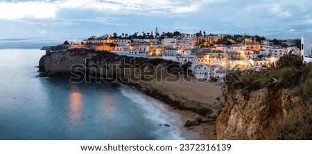 Panorama of Carvoeiro fishing village and tourist attraction in Algarve, Altantic Coast, Portugal Royalty-Free Stock Photo #2372316139