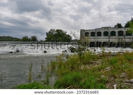 river Isonzo after heavy rain in Sagrado, Italy