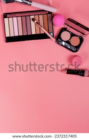Professional makeup tools. Makeup products on pink background. A set of various products for makeup. Royalty-Free Stock Photo #2372317405