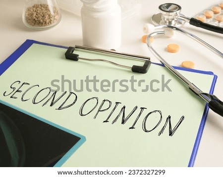 Second opinion is shown using a text and photo of stethoscope Royalty-Free Stock Photo #2372327299