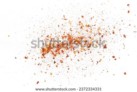 Spicy chili red pepper flakes, chopped, milled dry paprika pile isolated on white, top view Royalty-Free Stock Photo #2372334331