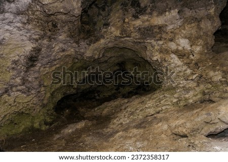 Karst cave. Background with selective focus and copy space for text.