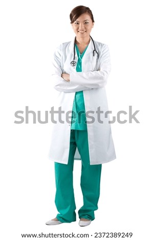 Female Asian doctor wearing a green Scrubs and stethoscope. Isolated on white. Full length Portrait.
