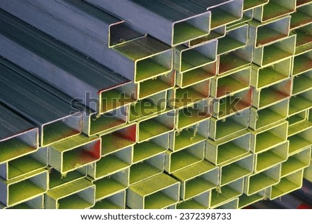 close up stack of colorful steel pipe