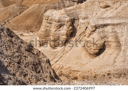 Qumran, Israel - August 13, 2023: Cave of the Dead Sea Scrolls, Qumran cave 4, at the ruins of Khirbet Qumran in the Judean desert of Israel near the Dead Sea.. Royalty-Free Stock Photo #2372406997