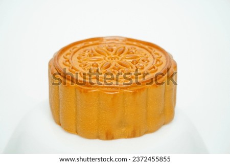 Moon cakes on white background, Chinese mid-autumn festival food.high-quality five kernels, milk flavored grapes, chestnuts, three flavors.
