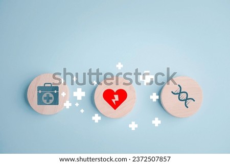 Wooden cubes Health insurance and medical welfare concept, service and healthcare medical icons, Emergency applications from smartphones for the elderly, health and access healthcare.