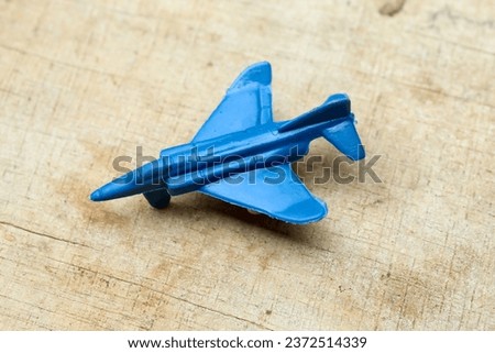 Blue children's toy fighter plane. children. toy plane