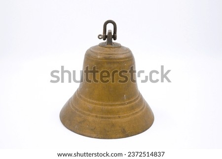 Golden bell isolated on white background.