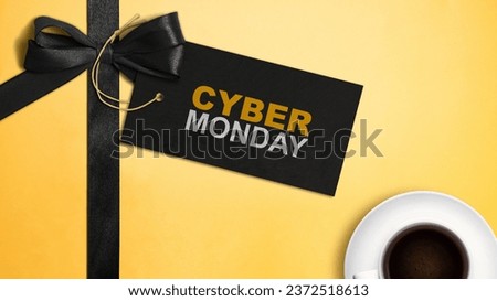 Gift box ribbon on a colored background. Cyber Monday concept