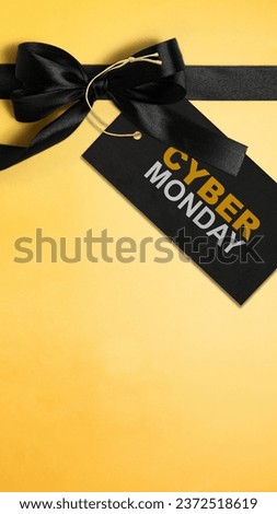 Gift box ribbon on a colored background. Cyber Monday concept