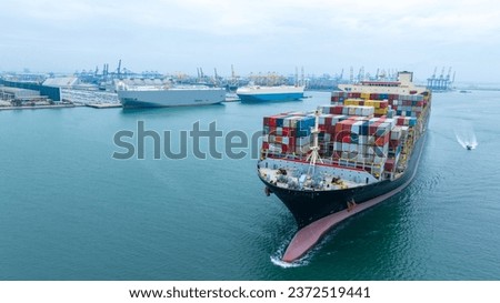 aerial front of cargo ship carrying container and running for export goods from cargo yard port to custom ocean concept freight shipping by ship 