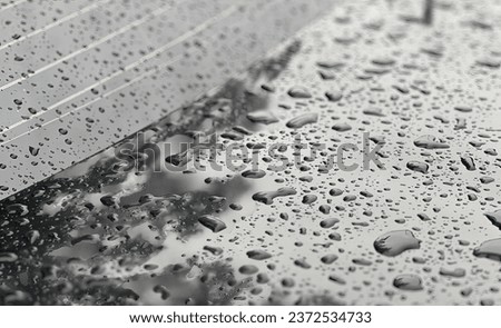 water drops on a car roof.