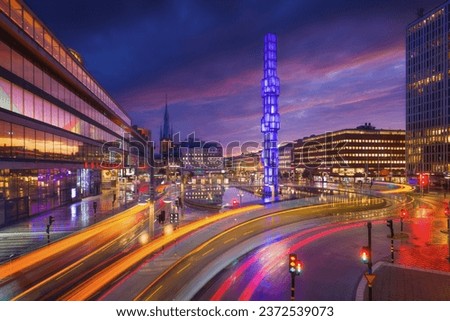 Sergels Square, Stockholm, Sweden. Popular place in the capital of Sweden. Public transport and blurred lights. Architectural landscape. Photo for postcards, wallpaper and backgrounds.  Royalty-Free Stock Photo #2372539073