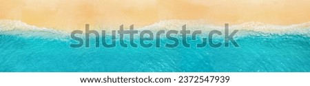 Peaceful aerial wide beach landscape, summer vacation Mediterranean holiday. Waves crash stunning blue ocean bay sea panoramic coastline. Tranquil aerial drone top view. Relaxing sunny beach, seaside Royalty-Free Stock Photo #2372547939