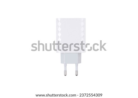 white usb smartphone power adapter or charger isolated on white background
