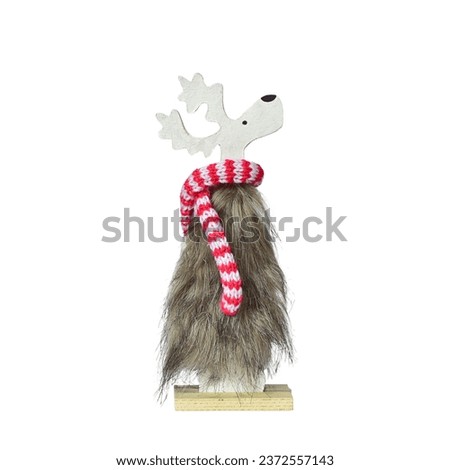 Christmas toy shaggy deer decoration with striped knitted scarf isolated on white background.