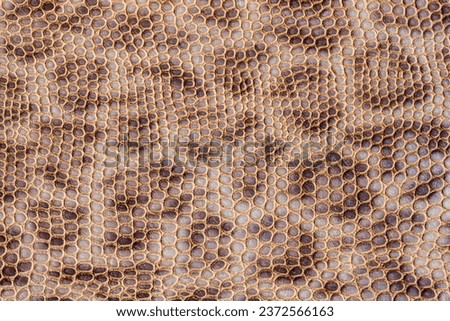Genuine leather texture,  skin of leopard, surface close-up, beyge brown color print, trendy background