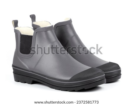 Rubber garden boot on a white background