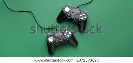Modern controllers on green background