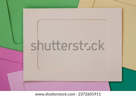 Colored frames with a blank, empty field for your design. Flat lay, top view. Copy space. Abstract background for creative ideas