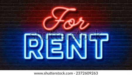 Neon sign on a brick wall - For rent