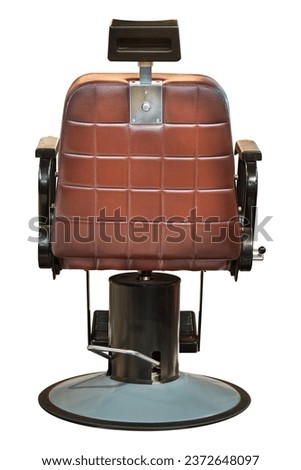 Vintage leather brown barber chair isolated on a white background Royalty-Free Stock Photo #2372648097