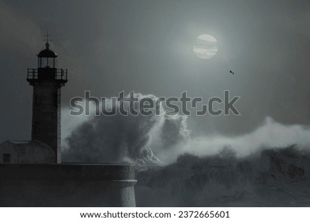 Old lighthouse in a foggy full moon night