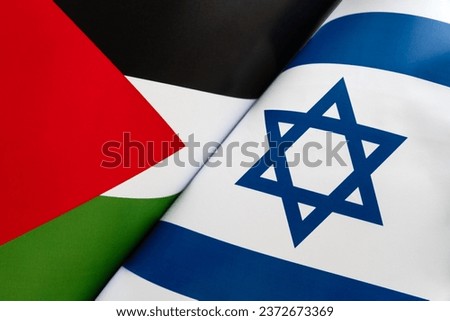 Background of flags of the Israel and palestine. concept of interaction or counteraction between two countries. International relations. political negotiations. war in the Middle East Royalty-Free Stock Photo #2372673369