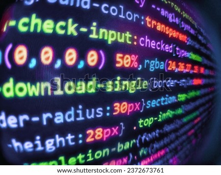 Web developer HTML code with CSS on screen. Search engi. Big data concepts working in cyberspace environment. Abstract screen of software v. Modern tech