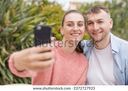 young caucasian couple expressing a concept