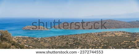 pretty panoramic view of old Venetian fortress and magical waters around Spinalonga, Crete. High quality photo