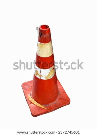 Old traffic cone isolated on white background. Royalty-Free Stock Photo #2372745601