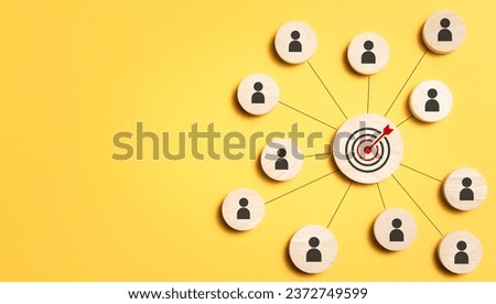 Customer relationship management concept. wooden block with target icon linked with human icons for customer focus group. Data exchanges development and customer service. Royalty-Free Stock Photo #2372749599