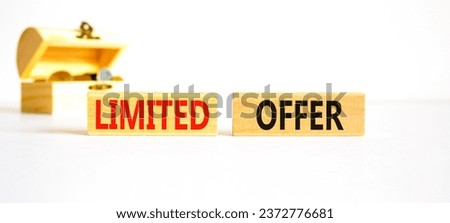 Limited offer symbol. Concept words Limited offer on beautiful wooden block. Beautiful white table background. Wooden chest coins. Business marketing, motivational Limited offer concept. Copy space.