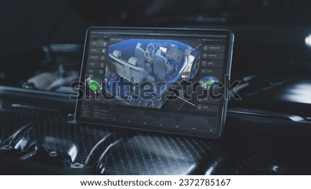 Digital tablet computer screen shows 3D futuristic graphical visualization of car developing professional software with 3D virtual electric vehicle model. Concept of modern car diagnostics technology.