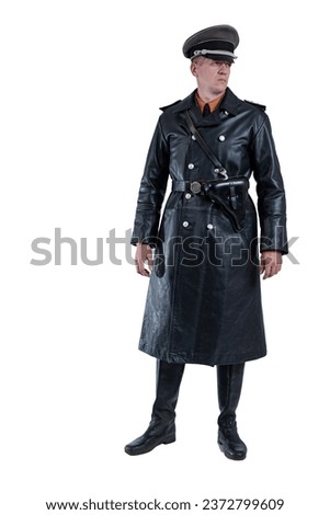 Male actor reenactor in historical uniform as an officer of the German Army during World War II Royalty-Free Stock Photo #2372799609