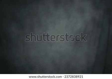Black photo studio backdrop cloth with abstract motif Royalty-Free Stock Photo #2372838921