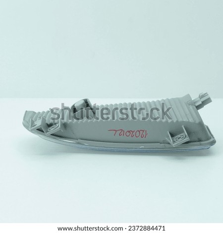 car headlight on a white background