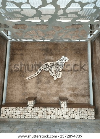 the terrace of the house is decorated with a picture of a tiger