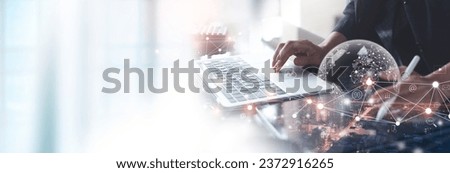 Digital marketing, data exchange, global business. Businessman using digital tablet computer double exposure with smart city, online marketing, data transfer, global internet network technology Royalty-Free Stock Photo #2372916265