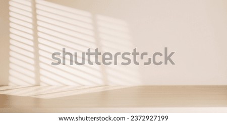 Wooden table and sunlit wall, product mockup background template Royalty-Free Stock Photo #2372927199