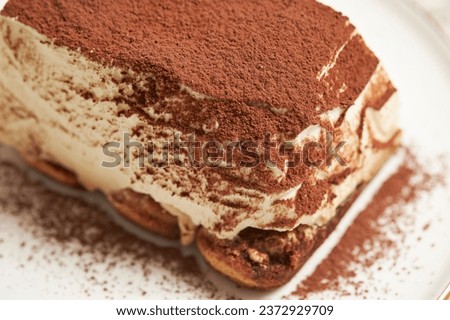 tiramisu cake on plate, dessert Royalty-Free Stock Photo #2372929709